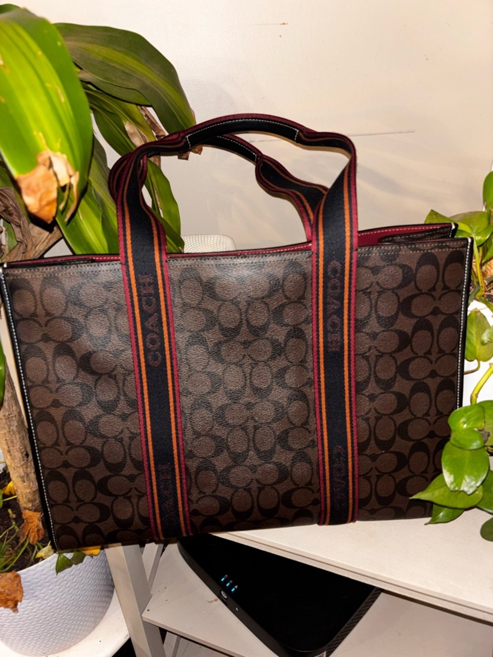 Coach Men’s Brown Signature Canvas Tote with Black and Red Striped Webbing
